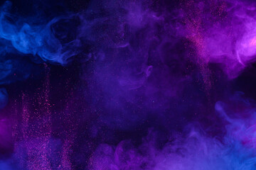 Colorful clouds of smoke and shiny glitter particles bursts abstract cosmic background