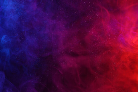 Colorful smoke clouds and shiny glitter abstract background