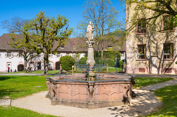The inner courtyard of the Lichtental Abbey with St. Mary‘s fountain in Baden Baden. Baden...