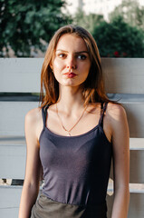 girl in a black T-shirt posing for the camera