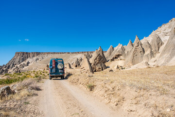 Ihlara Valley. 4x4 camper with the famous chimneys of the Cappadocia region in Turkey