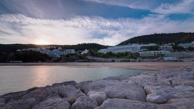 Sunset at the Atlantic Ocean, Bay of Sesimbra, Portugal timelapse