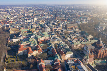Fototapeta premium Aeriel view to Krakow Poland roofs. Morning surise. Down town old city view from Wawel castle. 