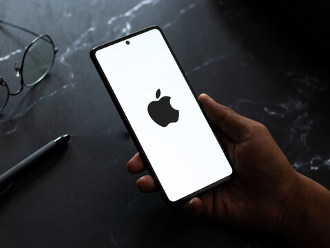 West Bangal, India - April 20, 2022 : Apple logo on phone screen stock image.