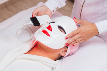 Use of led mask on patient for aesthetic treatment, relaxation, rejuvenation, color therapy, light...