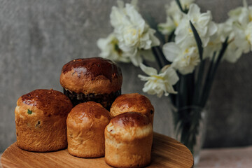 Delicious Easter cake and ingredients on wooden table
