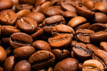 Close-up tasty roasted coffee beans.
