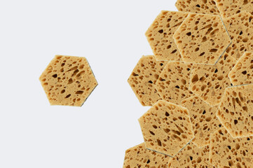 Natural sea sponges  washing dishes. White background.