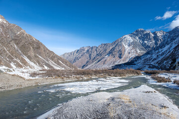Obraz premium Driving Georgian Military Road across the great Caucasus mountain range, you can stopping at unforgettable places as Kazbegi or Gudauri