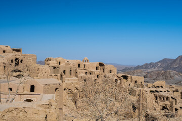 Fototapeta na wymiar Ruins of the adobe village of Kharanaq in Iran