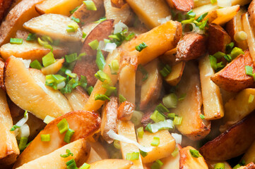 fried potatoes close-up. the concept of cooking vegetables. baked potatoes with onions