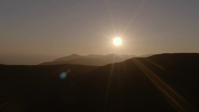Aerial Backward Silhouette Of Mountain Range During Sunset - Malibu, California