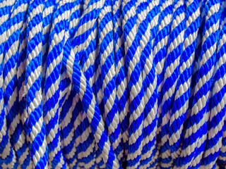 Close-up photography of a blue and white nylon rope.
