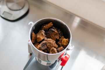 Powdered chaga mushroom powder. Medicinal chaga mushroom for brewing tea