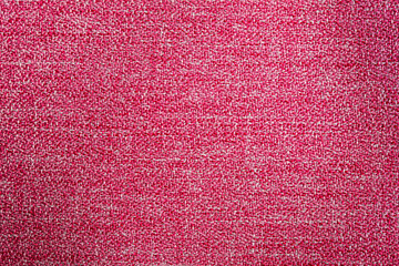 Closeup of red textured cloth background