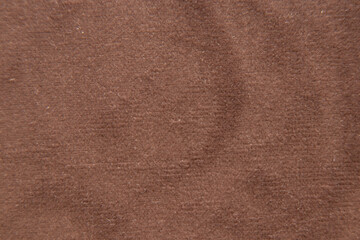 Soft brown fabric as a background macro photo, fabrics as an example for furniture