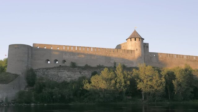 Narva.Estonia-August 11.2020: The huge Ivangorod castle on the border town in Russian side in Narva Estonia.geology shot