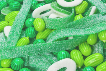 Assorted green gummy candies background. Top view. Jelly  sweets.