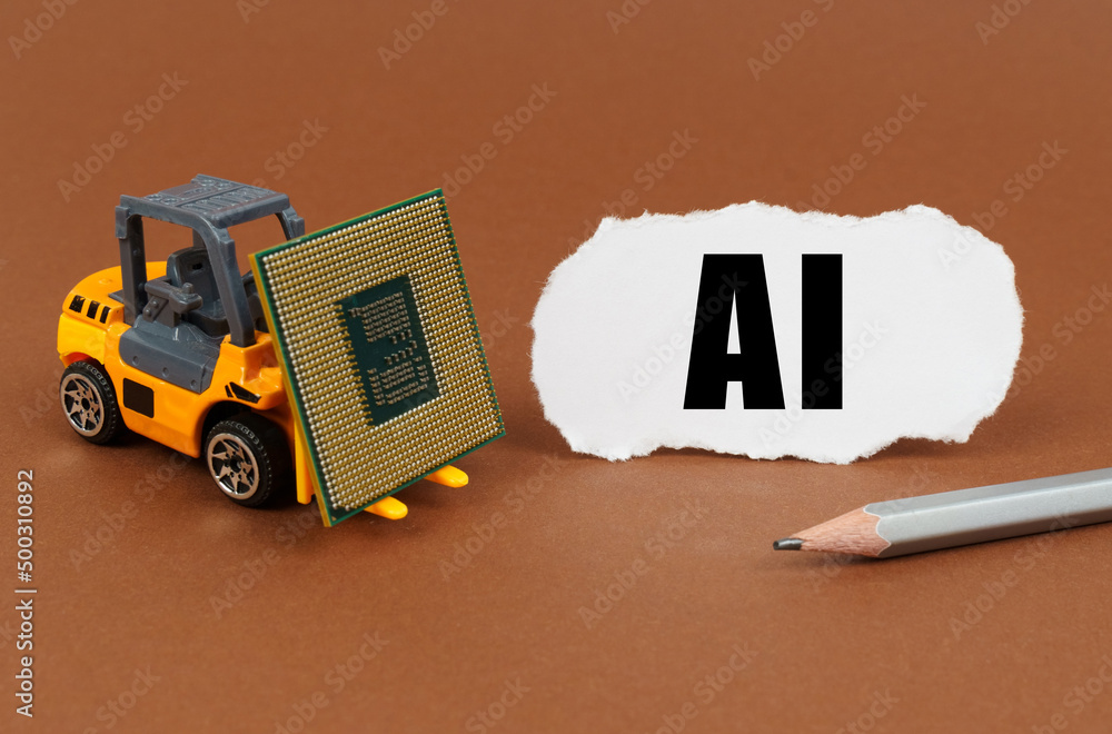 Poster on a brown surface, a forklift is transporting a processor, next to it is paper with the inscription