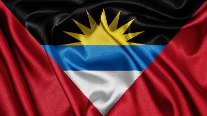 Close up realistic texture fabric textile silk satin flag of Antigua and Barbuda waving fluttering background. National symbol of the country. 1st of November, Happy Day concept