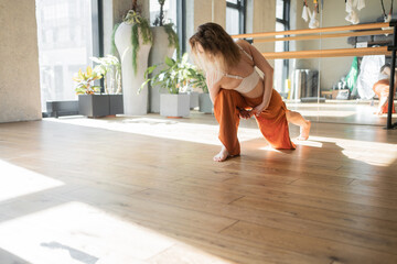 Confident woman yoga pose asana workout exercises , gymnastics and pilates. Sports equipment is...