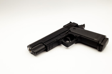 Black gun on white background
