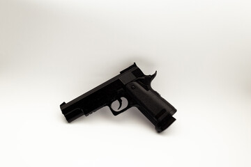 Black gun on white background