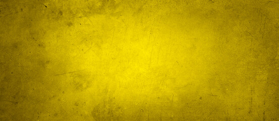 Yellow textured concrete wall wide background