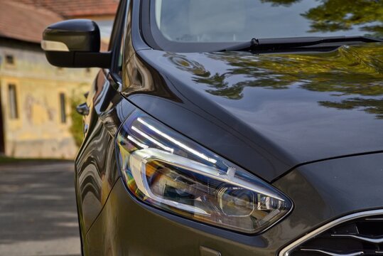 Ford S-Max Hybrid Vignale. Up to seven seater spacious and economical car. Front light car. 10-19-2021, Middle Bohemia, Czech Republic.