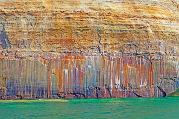 Colorful Minerals Leaching Through the Sandstone