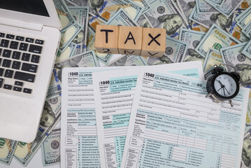 Blank forms 1040. US personal income tax return with accessories. Tax payment concept. Submission...