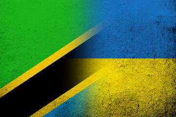 The United Republic of Tanzania National flag with National flag of Ukraine. Grunge background