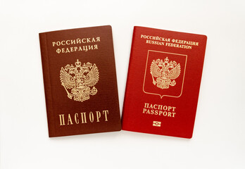 International and domestic russian passport isolated on white background. Top view.