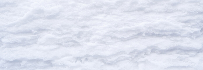 Banner. Winter snow. Snow texture Top view of the snow. Texture for design. Snowy white texture. Snowflakes.