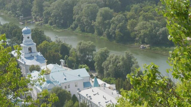 Svyatogorsk Lavra, Donetsk region, Ukraine. A beautiful old monastery is located in the valley of the Seversky Donets River on a mountain around the green foliage of trees