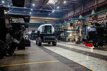 Naklejka premium Production line of assembling agricultural tractors and harvesters