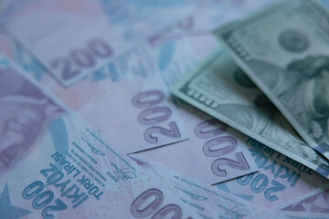Economy of Turkey concept photo. US dollars on the Turkish liras.