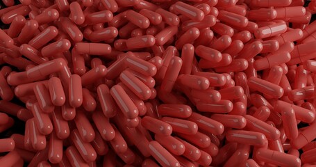 close up of a pile of red pills