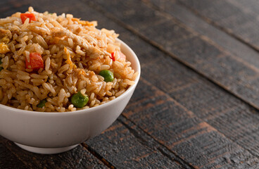 Bowl of Fried Rice on a Wooden Table