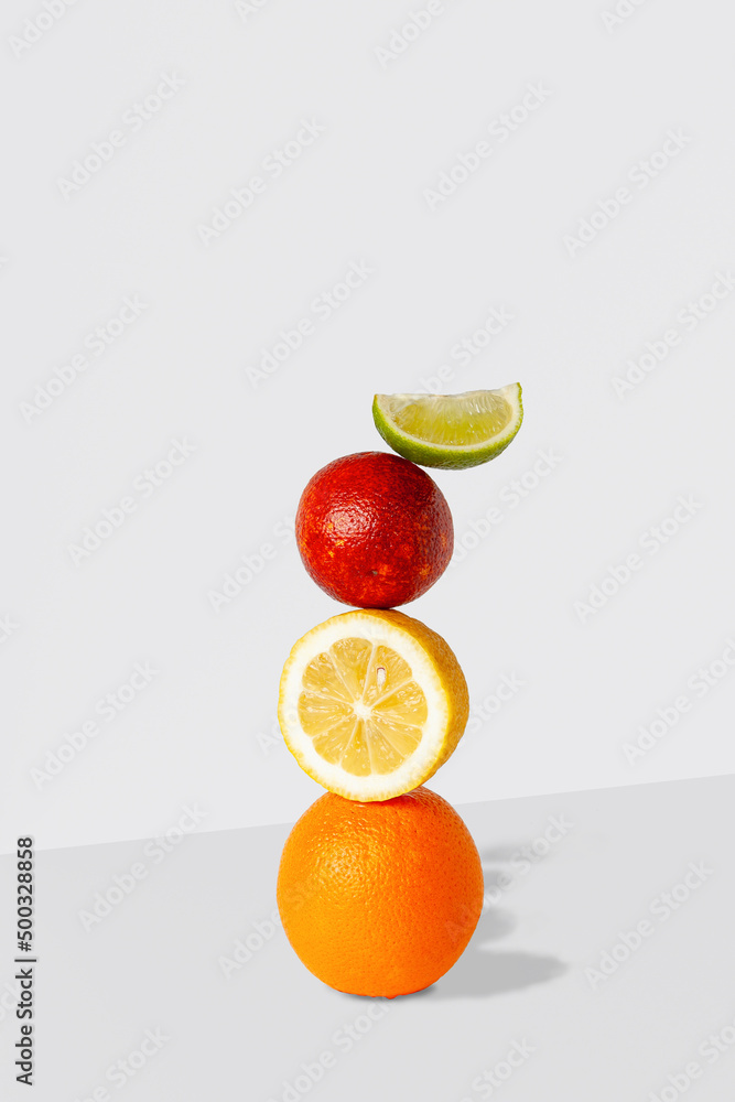 Wall mural nutritional balance of yellow and red orange, lime, lemon, fruits rich in vitamin c