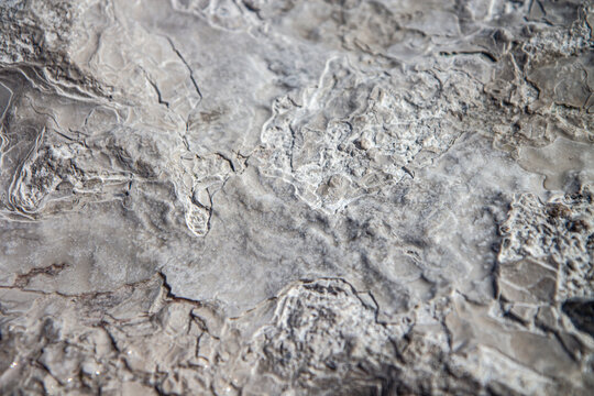 Stone texture covered with calcium deposits. Pamukale texture. Grey back.