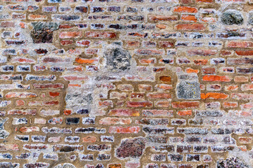 Detail of a brick wall with stones in the fortress, Spielberk Castle in Brno,
