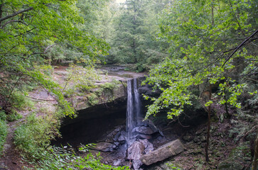 Beautiful waterfall in South Cumberland State Park on a warm summer day.