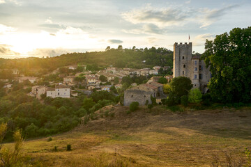 View of the castle of Esparron du Verdon in Provence in the south of France at sunset .