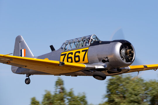 Tyabb, Australia - March 9, 2014: North American Aviation SNJ-4 VH-XSA single engine military training aircraft from World War II.