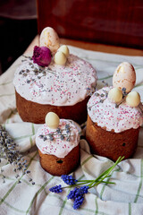 Easter cakes beautifully festive decoration with painted eggs lavender sequins flowers dried roses