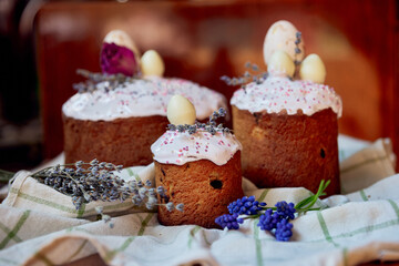 Easter cakes beautifully festive decoration with painted eggs lavender sequins flowers dried roses