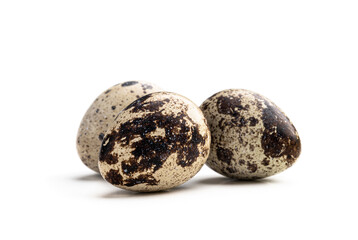 Obraz premium Quail eggs isolated on a white background