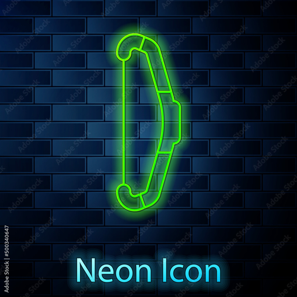 Sticker Glowing neon line Medieval bow icon isolated on brick wall background. Medieval weapon. Vector