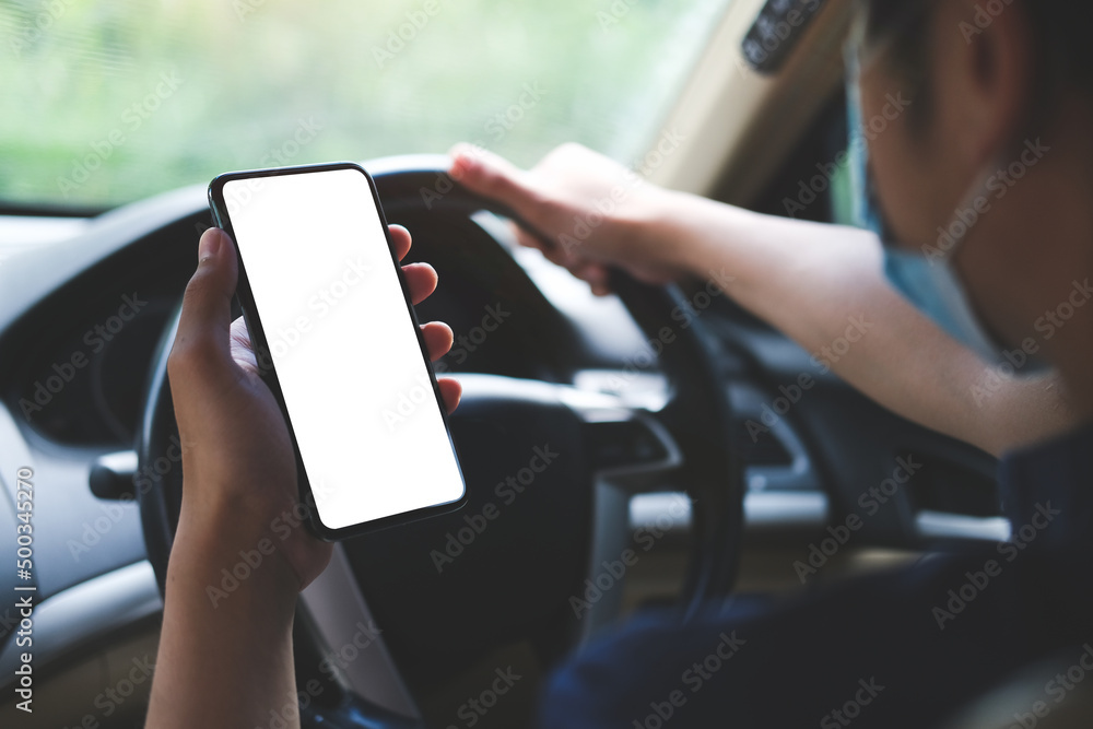 Poster close up shot of man using smartphone in car..